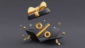ilustração de uma caixa de presente na cor preta com um laço dourado abrindo com descontos